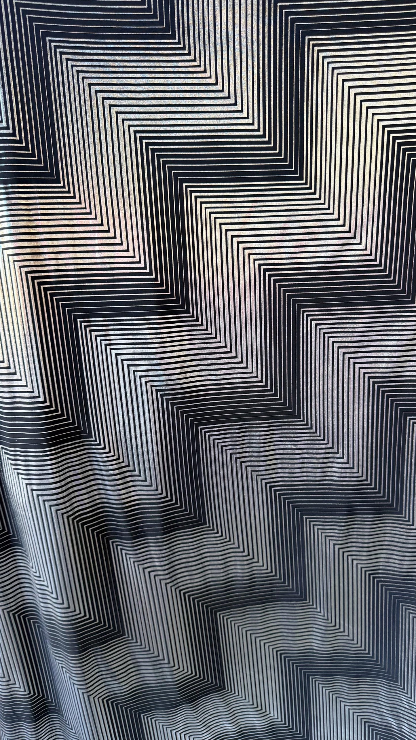 New 3D Pattern Geometric design on metallic poly spandex 2-way stretch 58/60” Sold by the YD. Ships worldwide from Los Angeles California