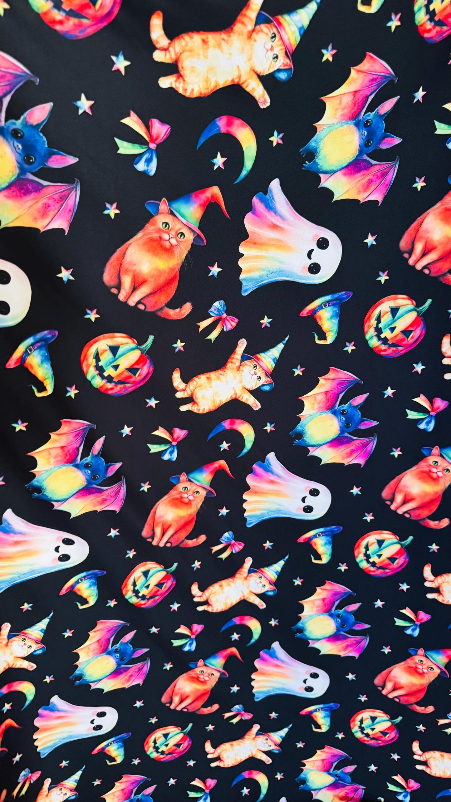 Halloween Multi designs Black/Rainbow print on Poly Spandex 4-way stretch 58/60” Sold by the YD. Ships Worldwide from Los Angele California