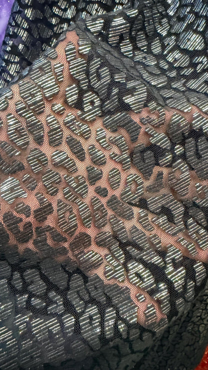 Leopard Exotic design Black/Silver on Metallic Burnout mesh  2-way stretch 58/60” Sold by the YD Ships Worldwide from Los Angeles California
