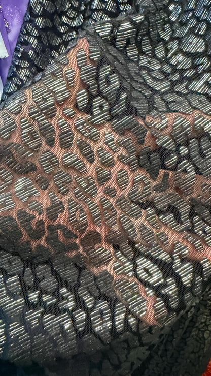 Leopard Exotic design Black/Silver on Metallic Burnout mesh  2-way stretch 58/60” Sold by the YD Ships Worldwide from Los Angeles California