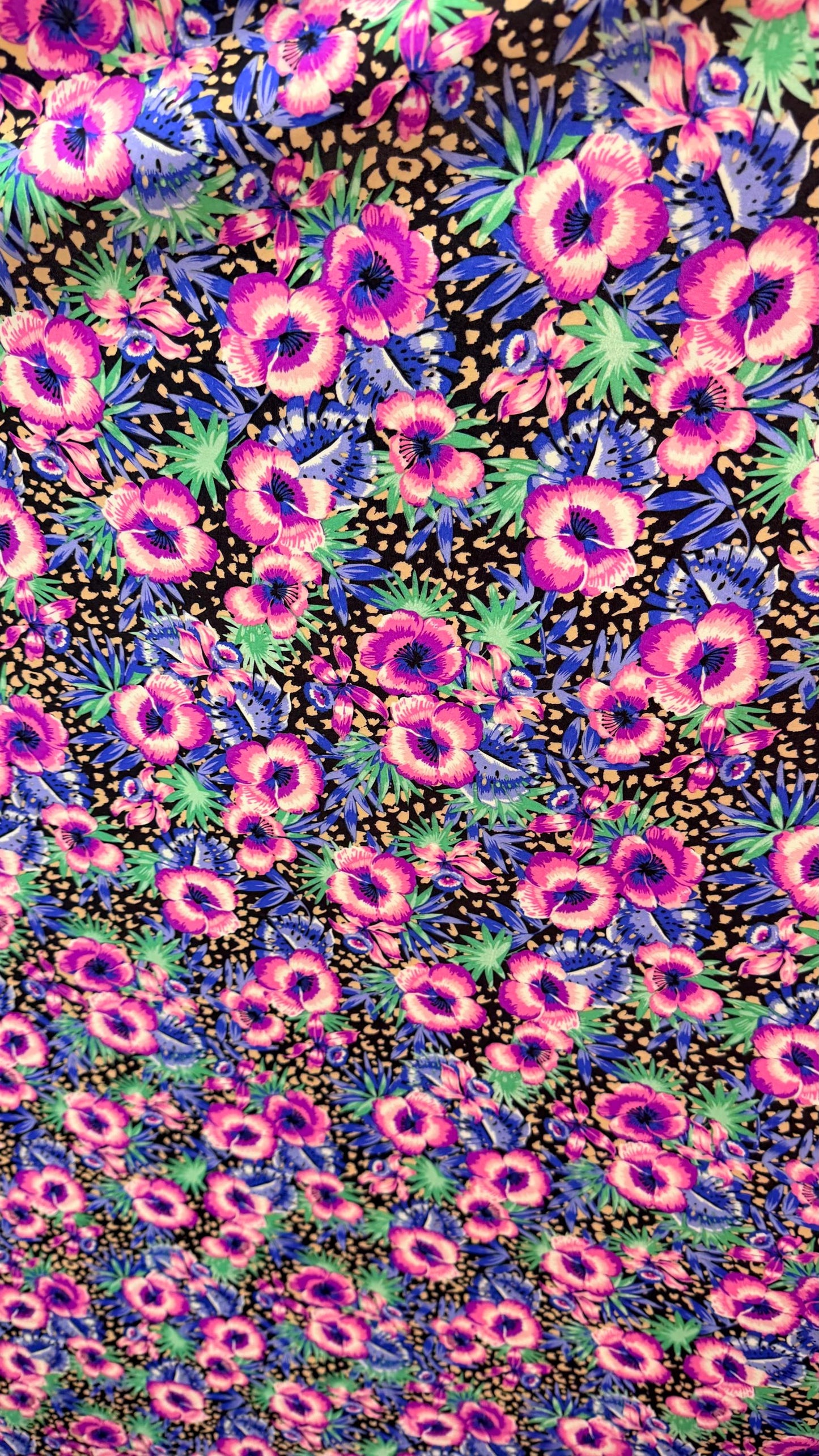 New Hiding Cheetah with flower design multicolor on nylon spandex 4way stretch 58/60" Sold by the YD. Ships worldwide from Los Angeles CA