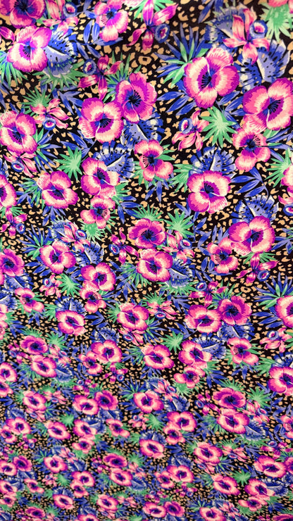 New Hiding Cheetah with flower design multicolor on nylon spandex 4way stretch 58/60" Sold by the YD. Ships worldwide from Los Angeles CA