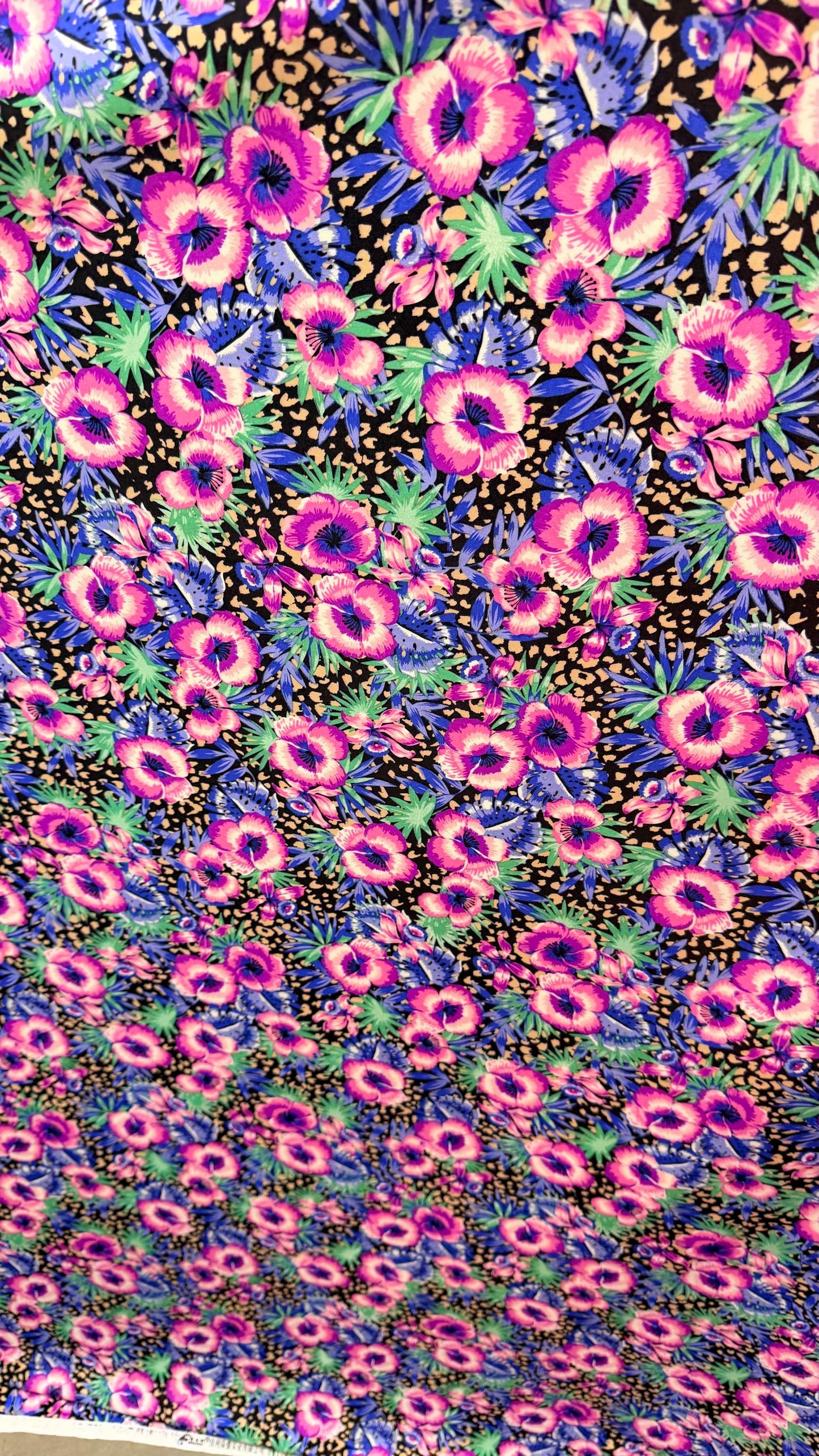 New Hiding Cheetah with flower design multicolor on nylon spandex 4way stretch 58/60" Sold by the YD. Ships worldwide from Los Angeles CA
