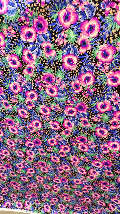 New Hiding Cheetah with flower design multicolor on nylon spandex 4way stretch 58/60" Sold by the YD. Ships worldwide from Los Angeles CA