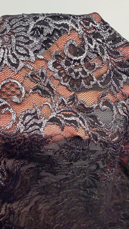 Metallic French stretch lace flower design Black/Silver 4-way stretch 54/55" sold by the YD. Ships worldwide from Los Angeles California USA