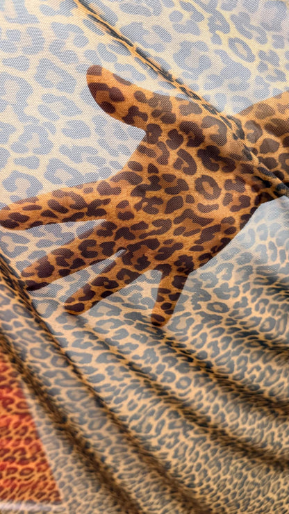 New Cheetah Exotic Animal print design on nylon power mesh 4way stretch 58/60” Sold by the YD. Ships worldwide from Los Angeles California