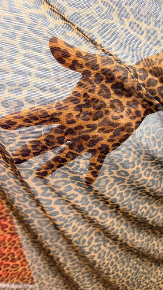 New Cheetah Exotic Animal print design on nylon power mesh 4way stretch 58/60” Sold by the YD. Ships worldwide from Los Angeles California