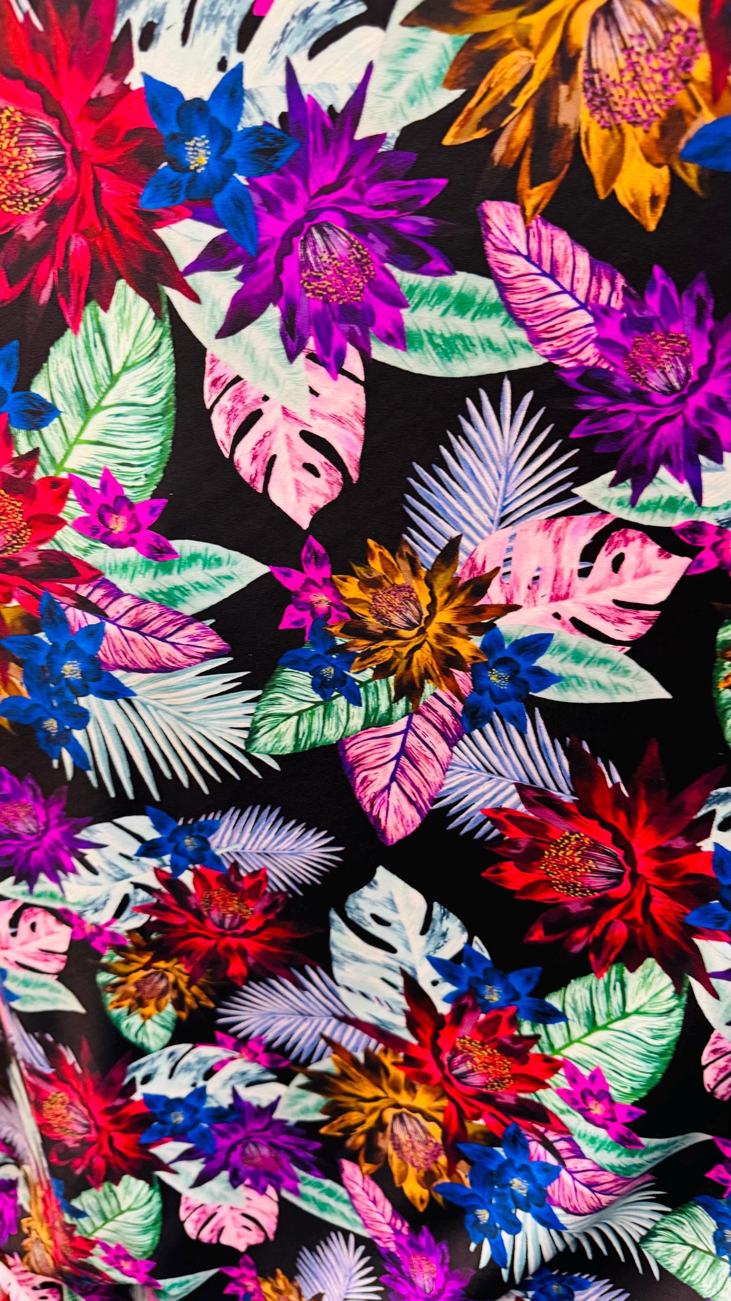 New print nylon spandex flower design Black multicolor 4way stretch 58/60" Sold by the YD. Ships worldwide from Los Angeles California USA.