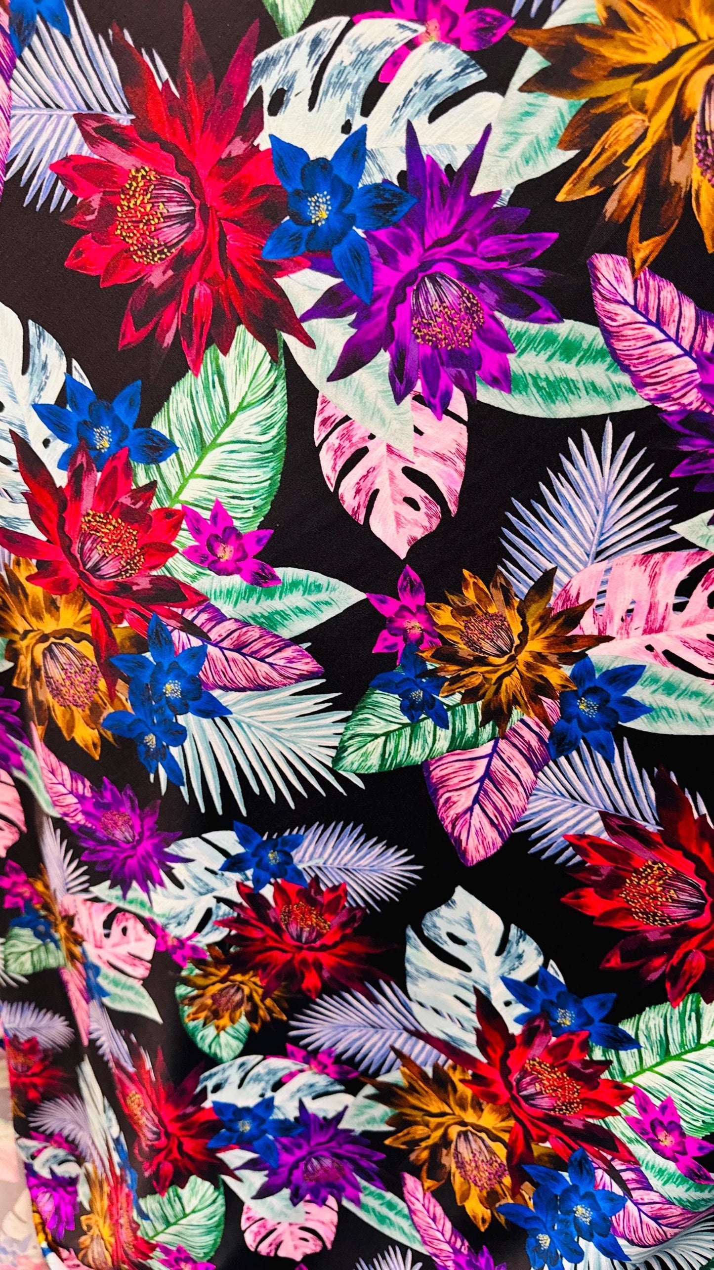 New print nylon spandex flower design Black multicolor 4way stretch 58/60" Sold by the YD. Ships worldwide from Los Angeles California USA.
