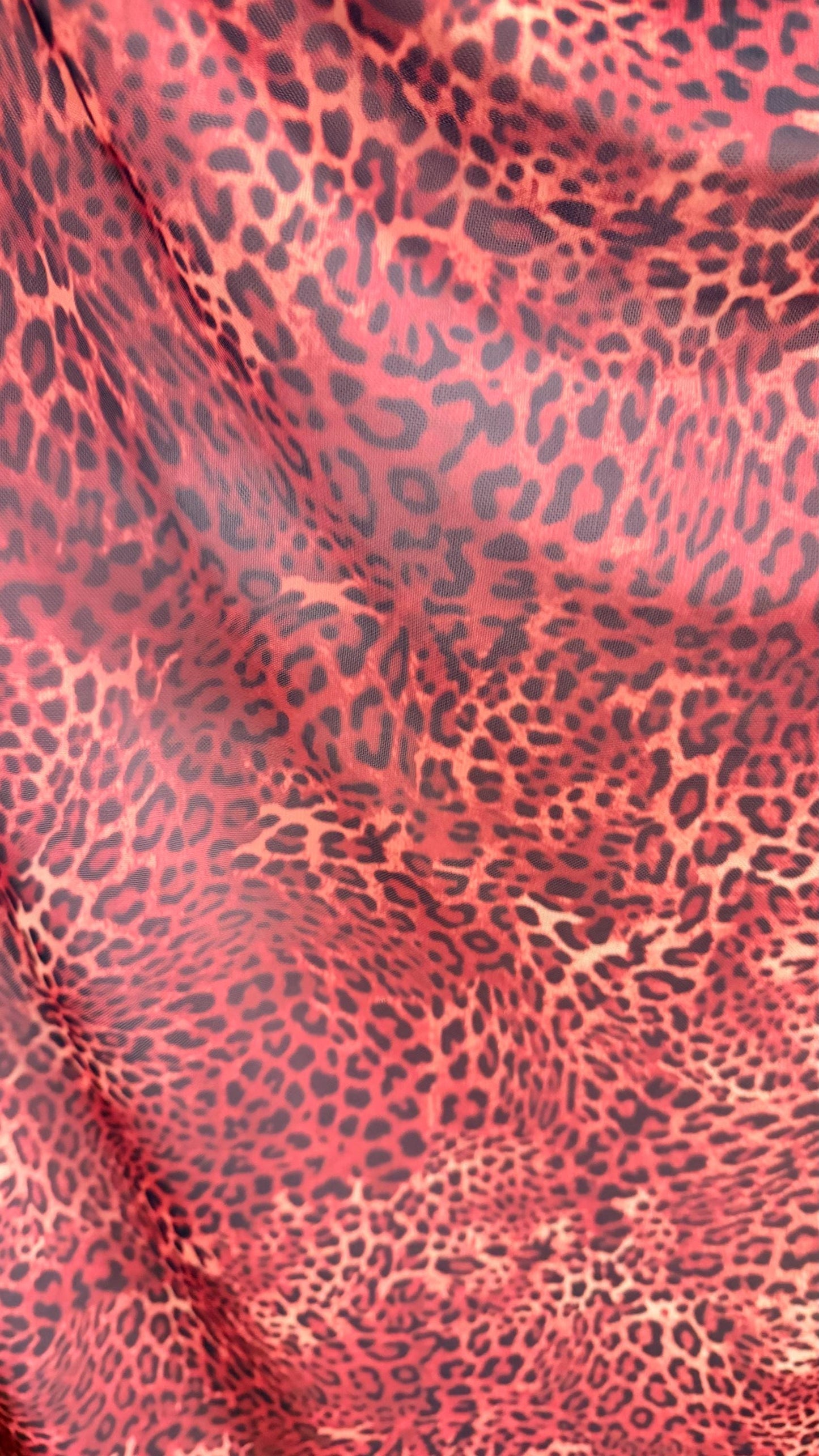 New exotic leopard design Rust/Brown print on power mesh 4-way stretch 58/60” Sold by the YD. Ships worldwide from Los Angeles California