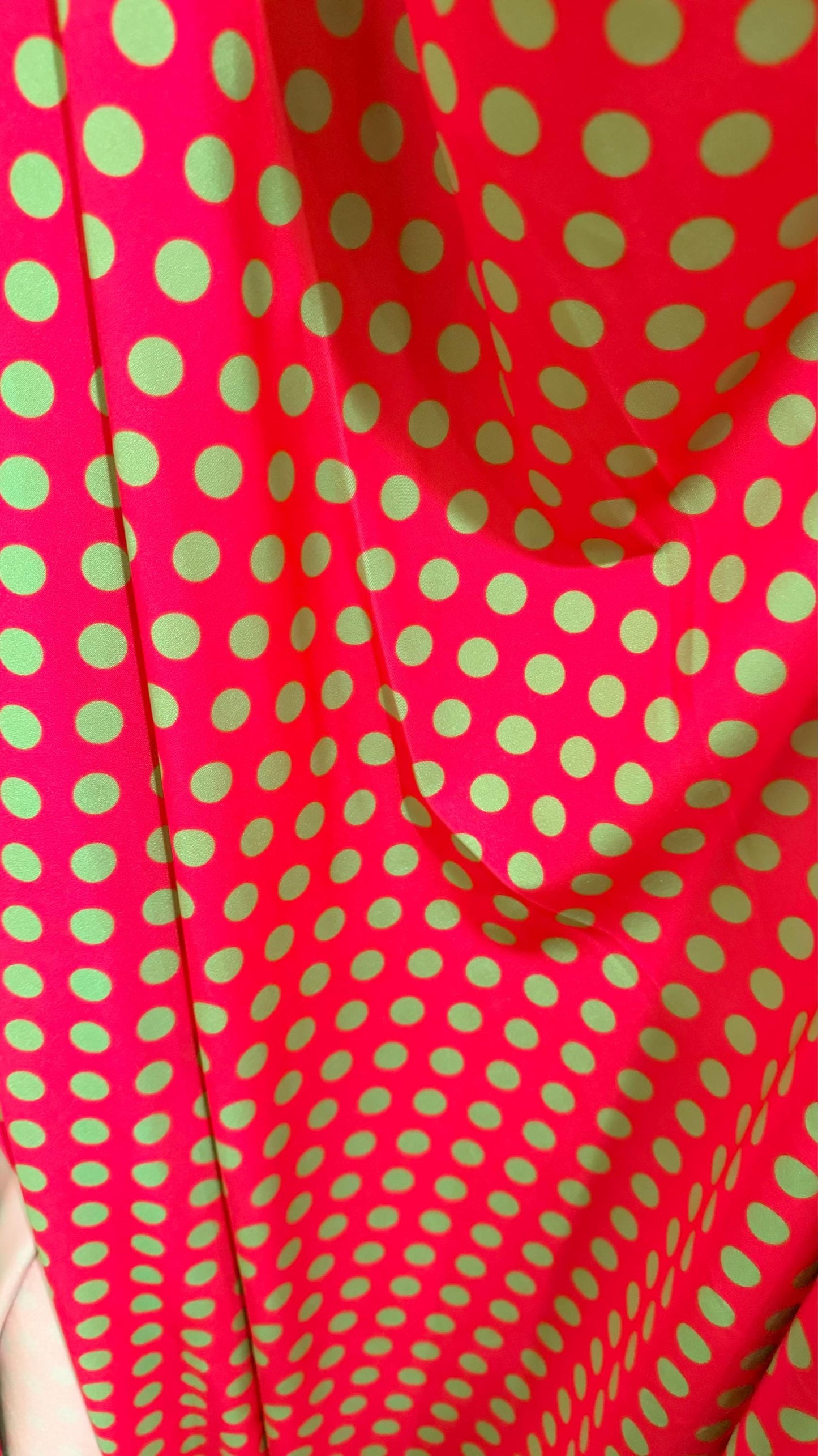 Polka dots design print on shiny  nylon spandex 4way stretch  58/60" sold by the Yd. Ships worldwide from Los Angeles California USA.