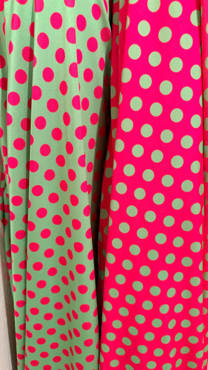 Polka dots design print on shiny  nylon spandex 4way stretch  58/60" sold by the Yd. Ships worldwide from Los Angeles California USA.