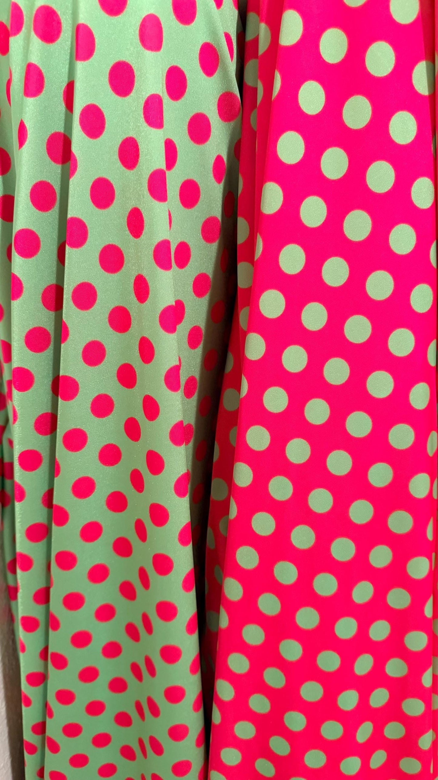 Polka dots design print on shiny  nylon spandex 4way stretch  58/60" sold by the Yd. Ships worldwide from Los Angeles California USA.