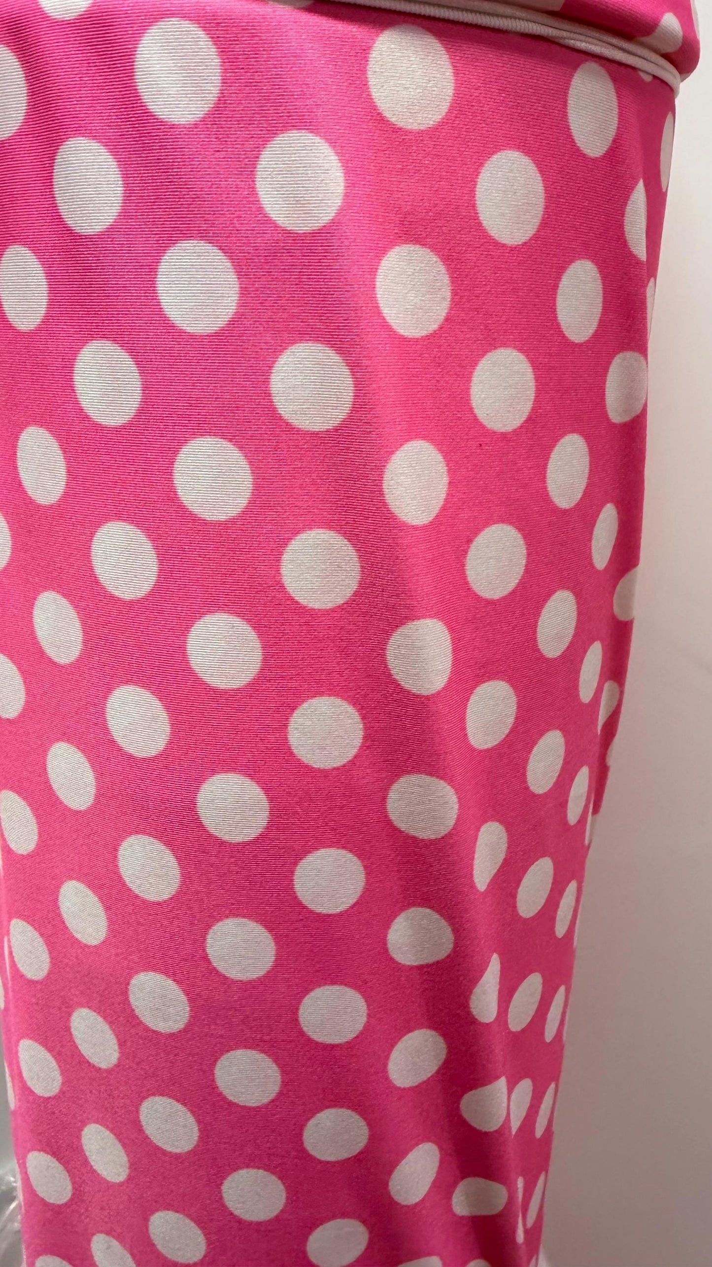 Polka dots design Bubblegum/White print on poly spandex 4-way stretch 58/60” Sold by the YD. Ships Worldwide from Los Ángeles California USA