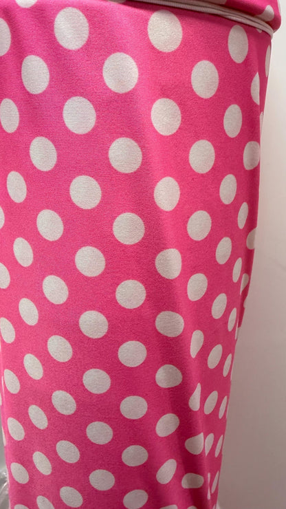 Polka dots design Bubblegum/White print on poly spandex 4-way stretch 58/60” Sold by the YD. Ships Worldwide from Los Ángeles California USA