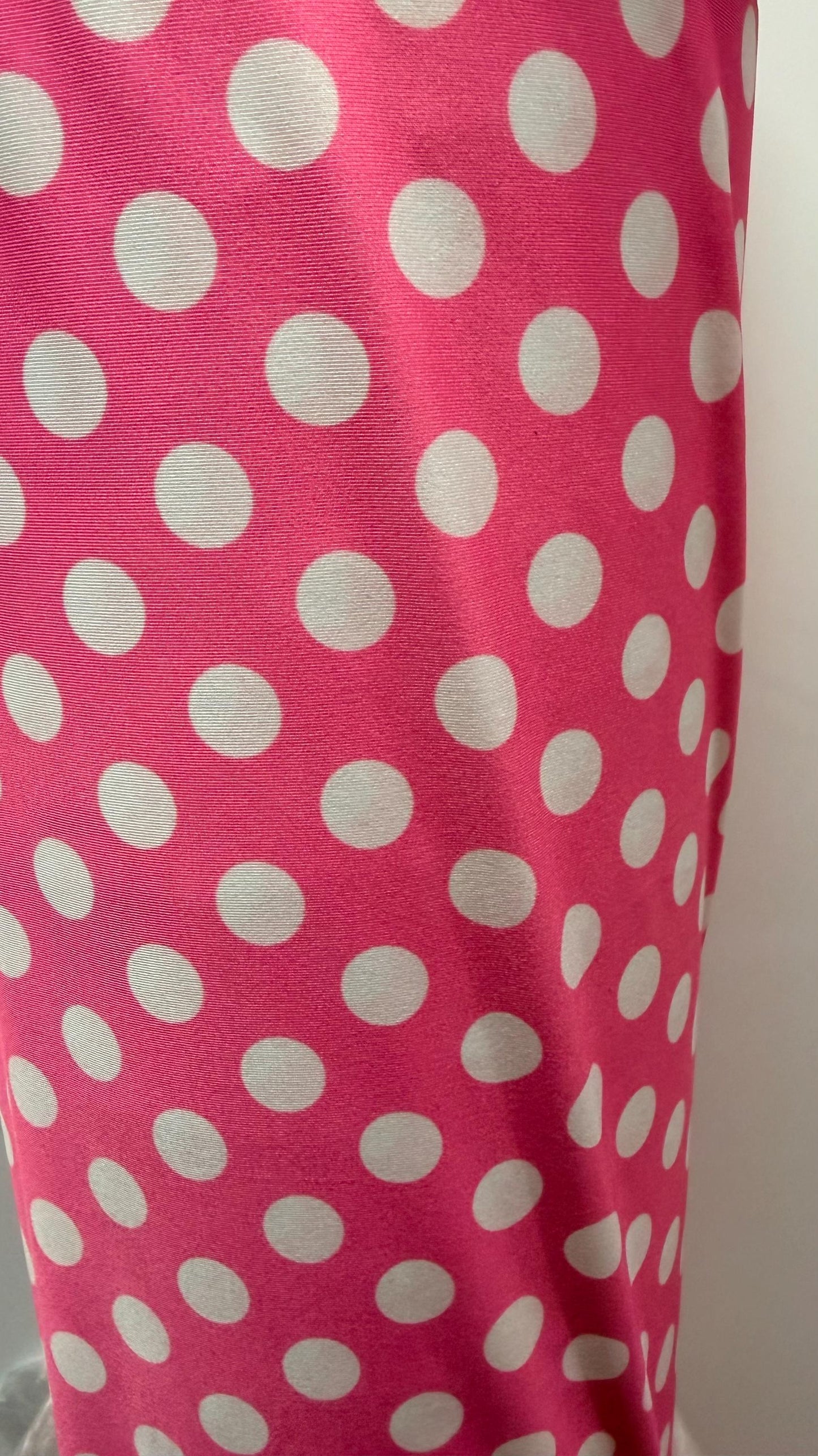 Polka dots design Bubblegum/White print on poly spandex 4-way stretch 58/60” Sold by the YD. Ships Worldwide from Los Ángeles California USA