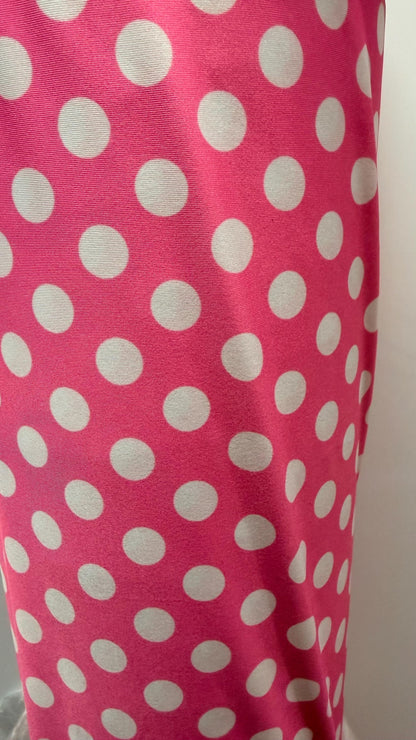 Polka dots design Bubblegum/White print on poly spandex 4-way stretch 58/60” Sold by the YD. Ships Worldwide from Los Ángeles California USA