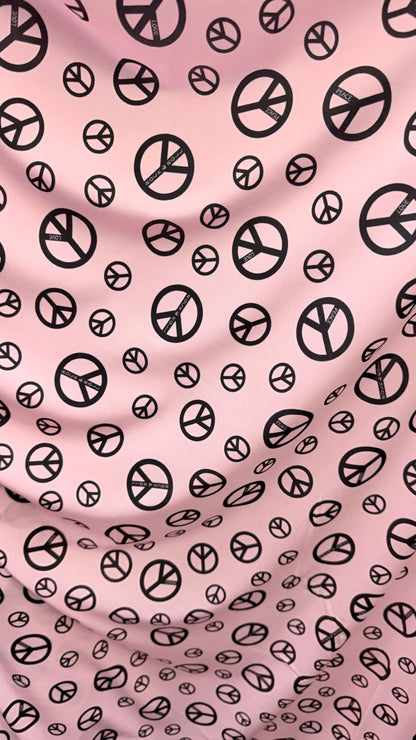 Love and Peace design print on great quality of nylon spandex 4way stretch 58/60" Sold by the YD. Ships worldwide from Los Angeles CA USA