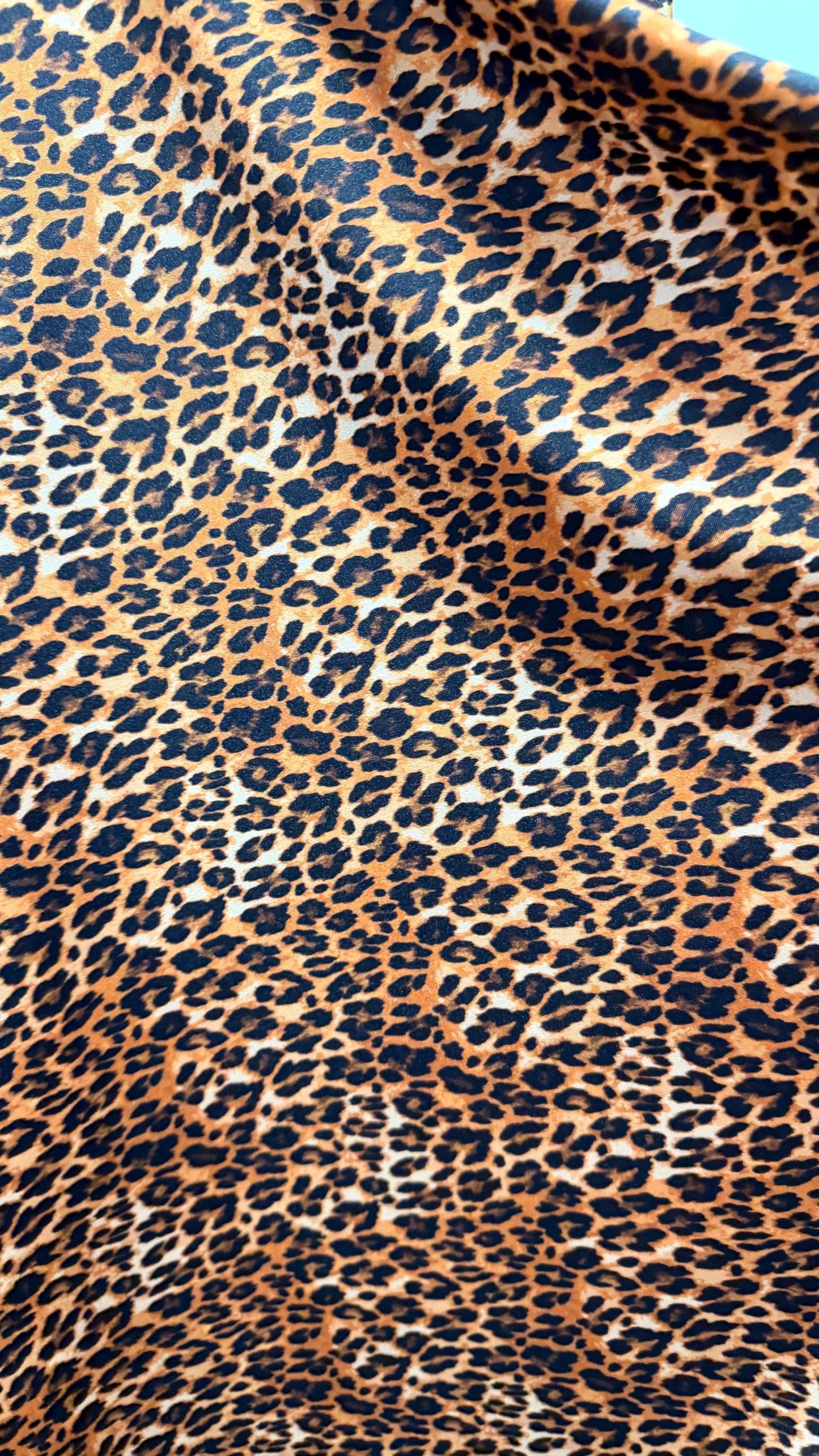NEW Leopard Exotic design print on nylon Spandex 4-way stretch 58/60” Sold by the YD. Ships worldwide from Los Angeles California USA.