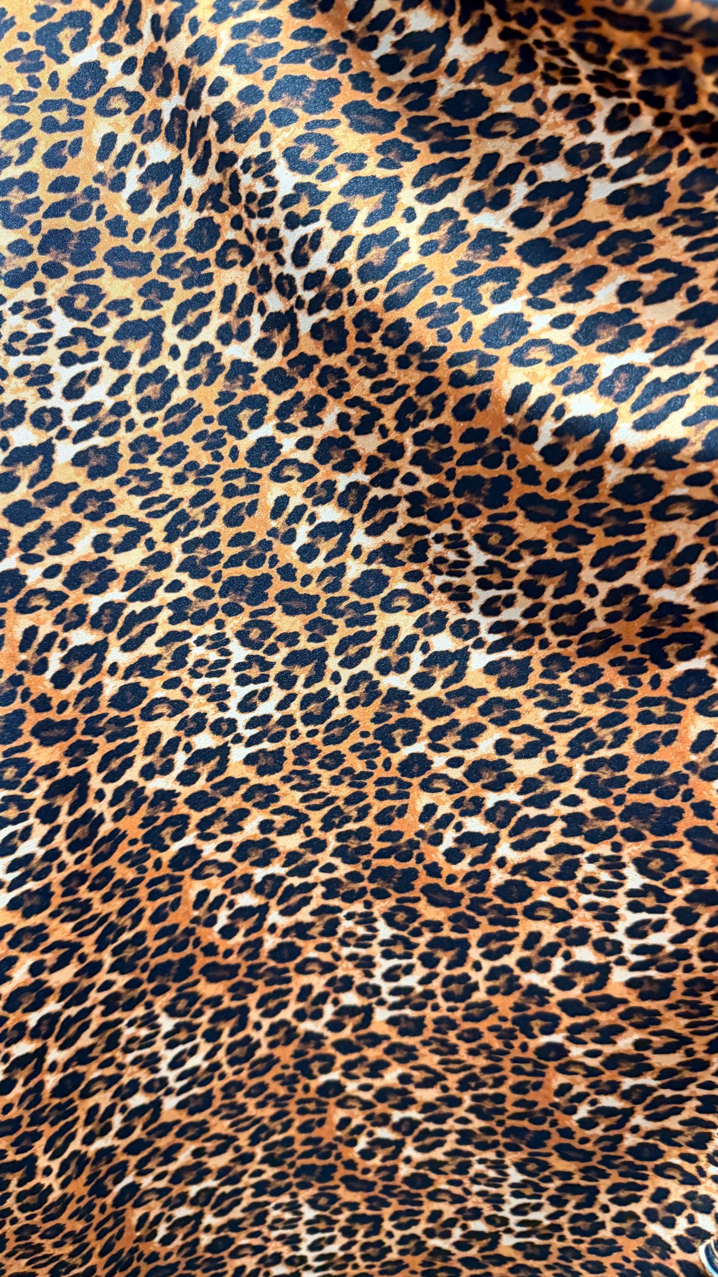 NEW Leopard Exotic design print on nylon Spandex 4-way stretch 58/60” Sold by the YD. Ships worldwide from Los Angeles California USA.