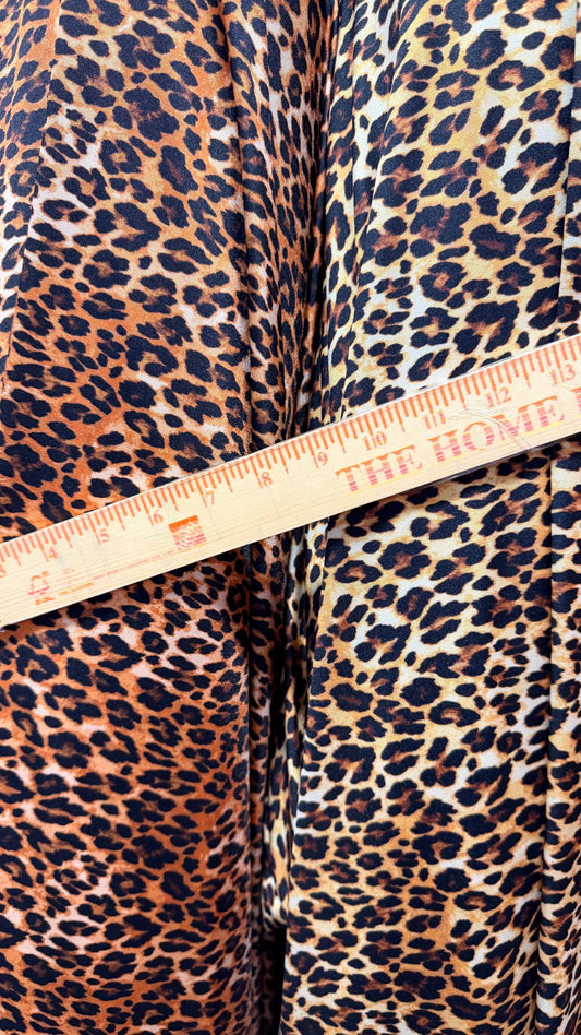 NEW Leopard Exotic design print on nylon Spandex 4-way stretch 58/60” Sold by the YD. Ships worldwide from Los Angeles California USA.
