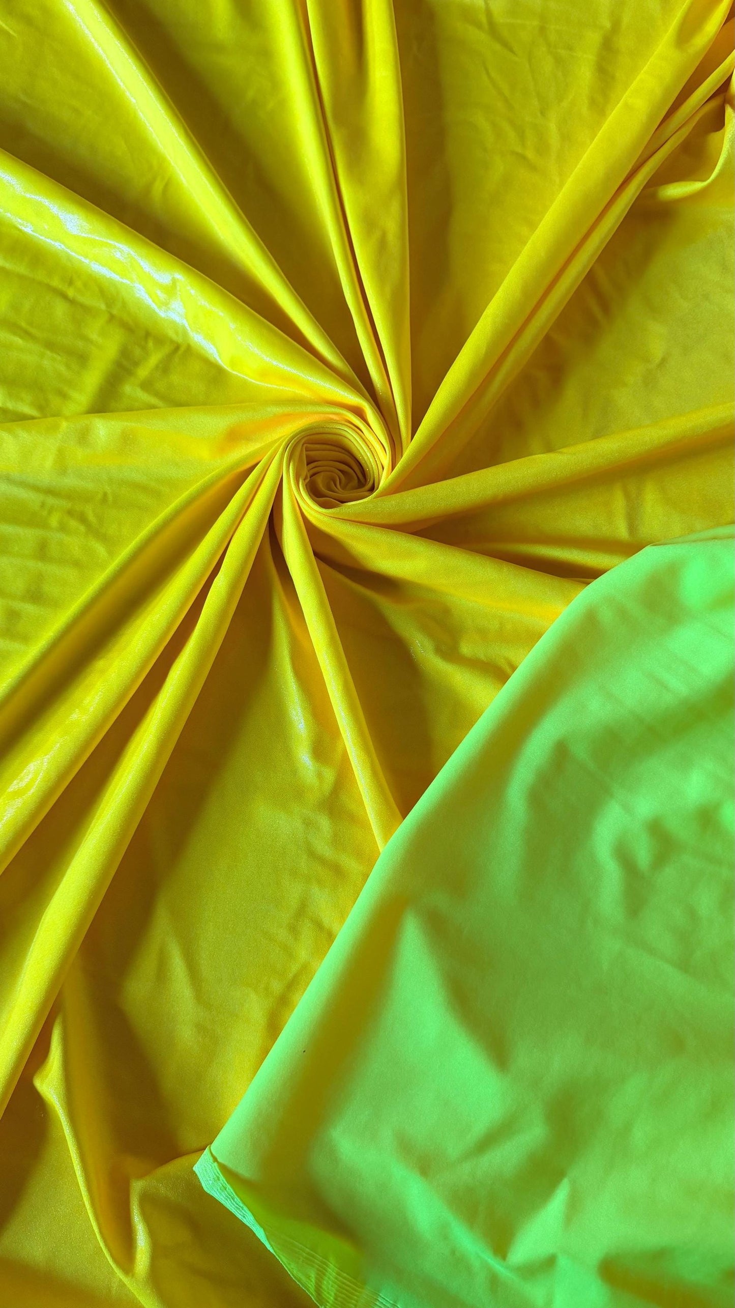 New Neon Yellow foggy foil nylon spandex 4way stretch 58/60" Sold by the YD. Ships worldwide from Los Angeles California USA.