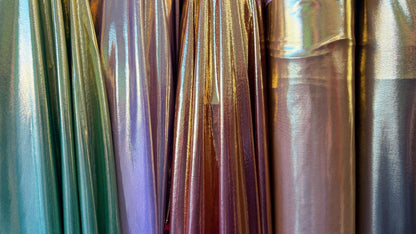 New Super Shiny metallic poly spandex with foil 2-way stretch light weight 58/60” Sold by the YD. Ships worldwide from Los Angeles Californi