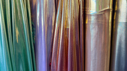 New Super Shiny metallic poly spandex with foil 2-way stretch light weight 58/60” Sold by the YD. Ships worldwide from Los Angeles Californi