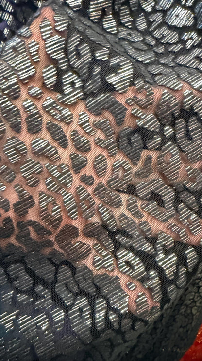 Leopard Exotic design Black/Silver on Metallic Burnout mesh  2-way stretch 58/60” Sold by the YD Ships Worldwide from Los Angeles California