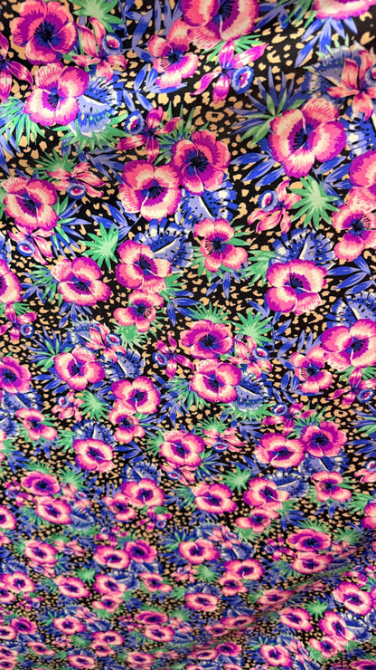 New Hiding Cheetah with flower design multicolor on nylon spandex 4way stretch 58/60" Sold by the YD. Ships worldwide from Los Angeles CA