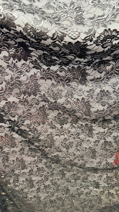 Metallic French stretch lace flower design Black/Silver 4-way stretch 54/55" sold by the YD. Ships worldwide from Los Angeles California USA