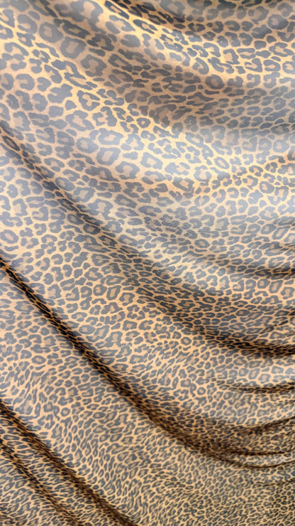 New Cheetah Exotic Animal print design on nylon power mesh 4way stretch 58/60” Sold by the YD. Ships worldwide from Los Angeles California