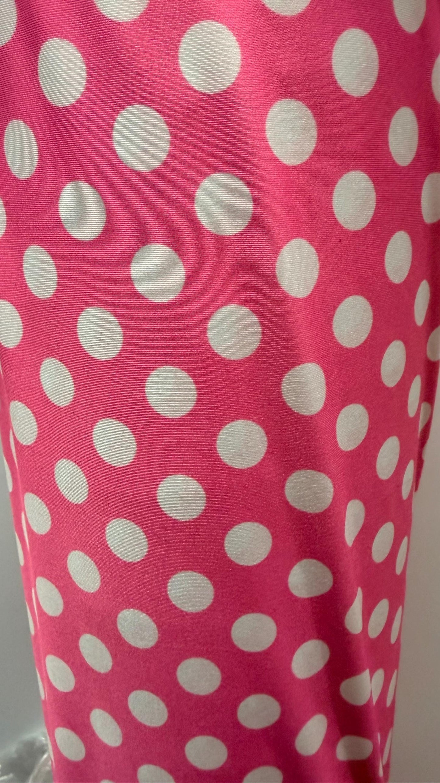 Polka dots design Bubblegum/White print on poly spandex 4-way stretch 58/60” Sold by the YD. Ships Worldwide from Los Ángeles California USA