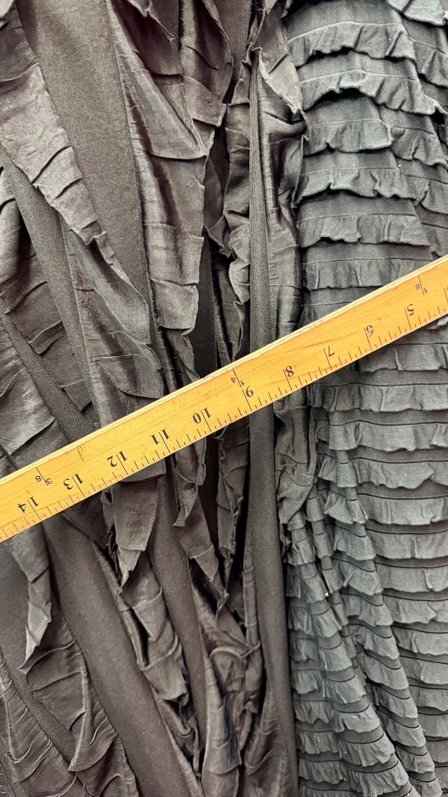 Ruffles design 1” and 2”  black/black  ruffle poly spandex 4-way stretch 55/57” Sold by the YD.