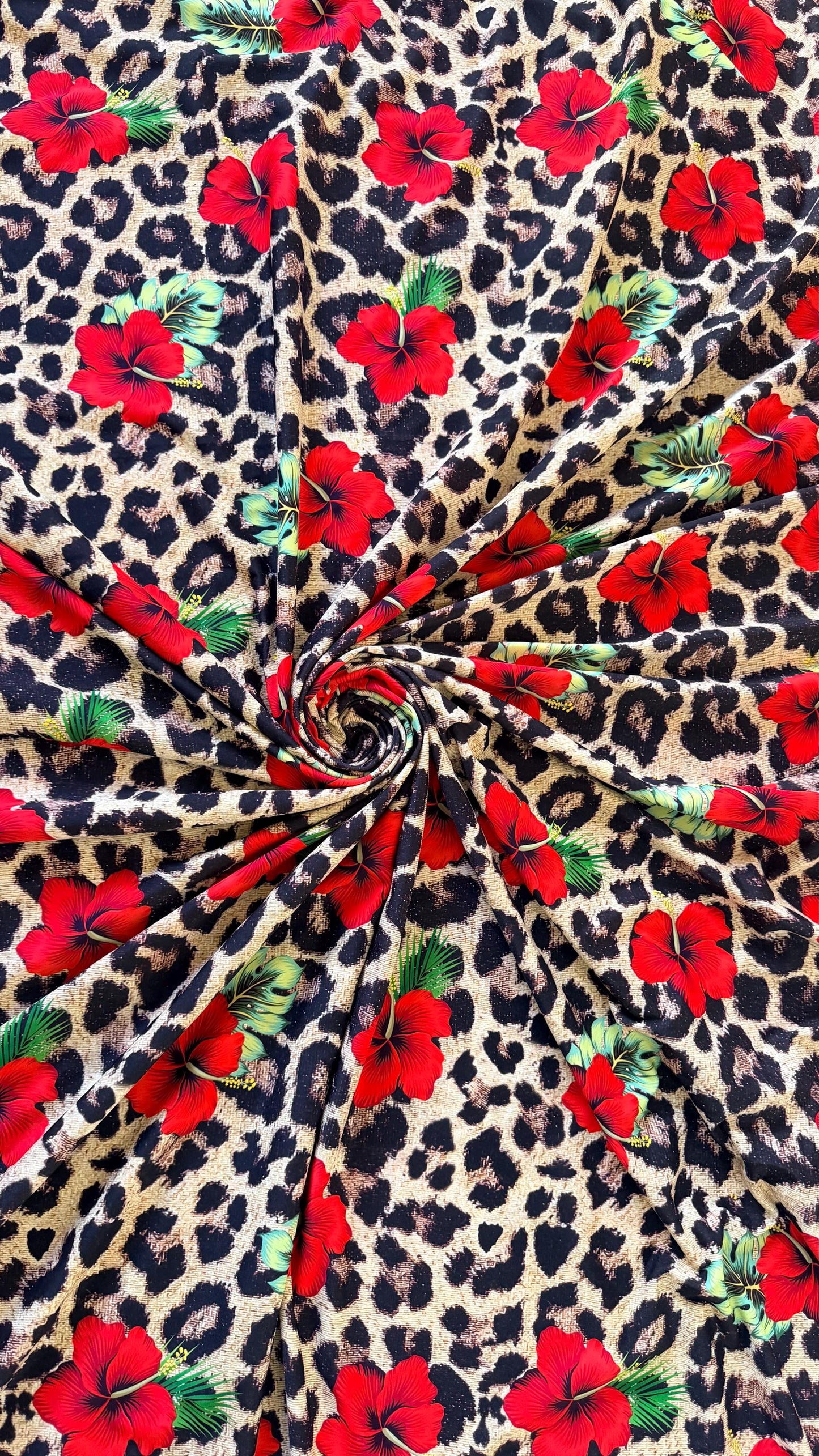 New Hiding Leopard design with red flowers Nylon Spandex 4-way stretch 58/60” High quality fabrics by AlexLAFabrics