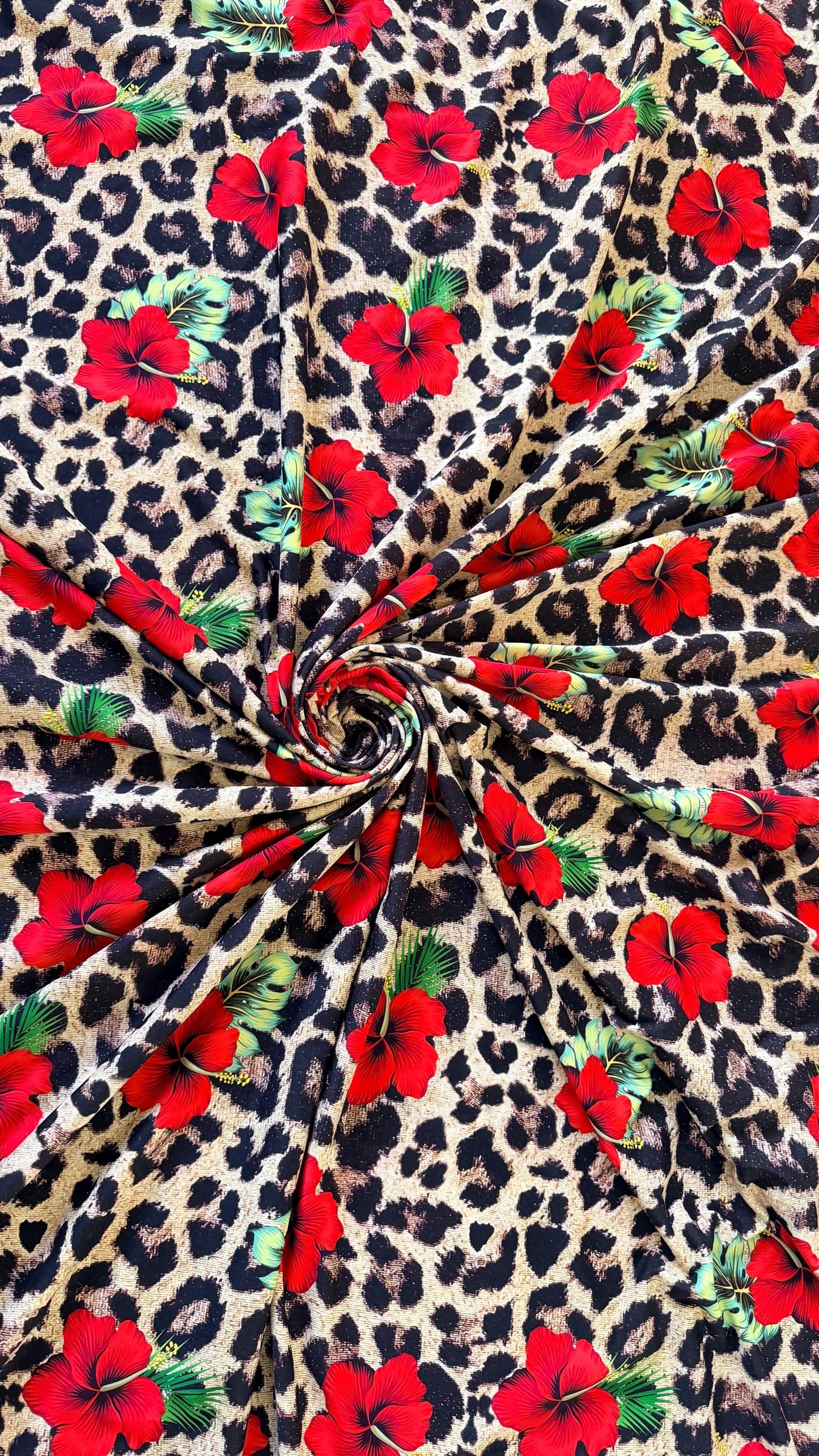New Hiding Leopard design with red flowers Nylon Spandex 4-way stretch 58/60” High quality fabrics by AlexLAFabrics