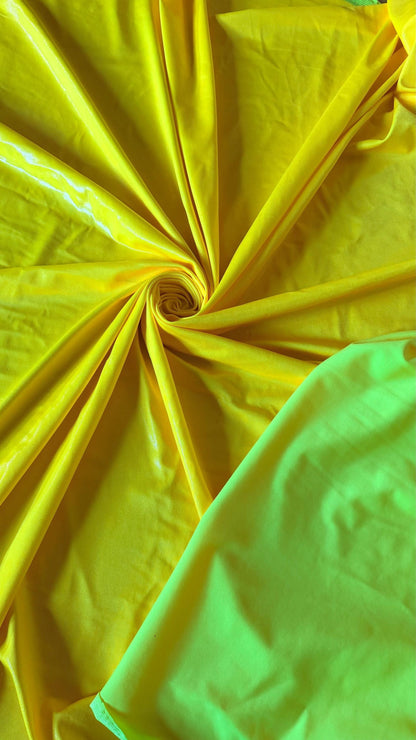 New Neon Yellow foggy foil nylon spandex 4way stretch 58/60" Sold by the YD. Ships worldwide from Los Angeles California USA.