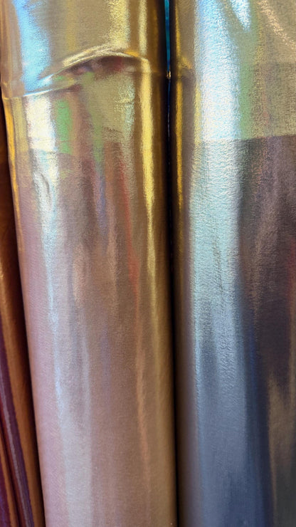New Super Shiny metallic poly spandex with foil 2-way stretch light weight 58/60” Sold by the YD. Ships worldwide from Los Angeles Californi