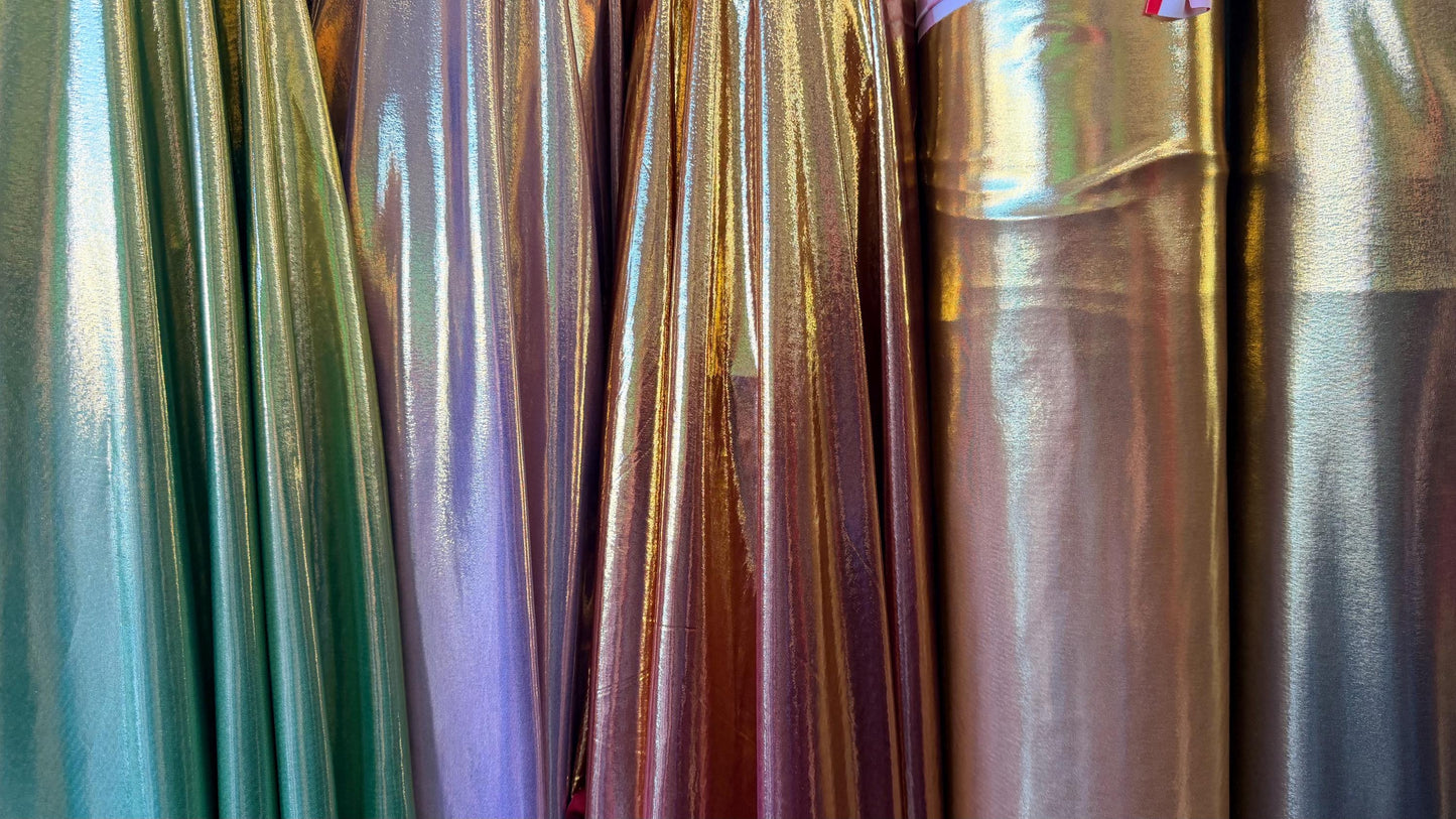 New Super Shiny metallic poly spandex with foil 2-way stretch light weight 58/60” Sold by the YD. Ships worldwide from Los Angeles Californi