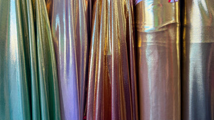 New Super Shiny metallic poly spandex with foil 2-way stretch light weight 58/60” Sold by the YD. Ships worldwide from Los Angeles Californi