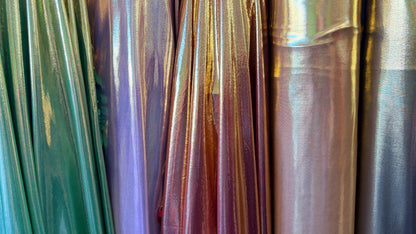 New Super Shiny metallic poly spandex with foil 2-way stretch light weight 58/60” Sold by the YD. Ships worldwide from Los Angeles Californi