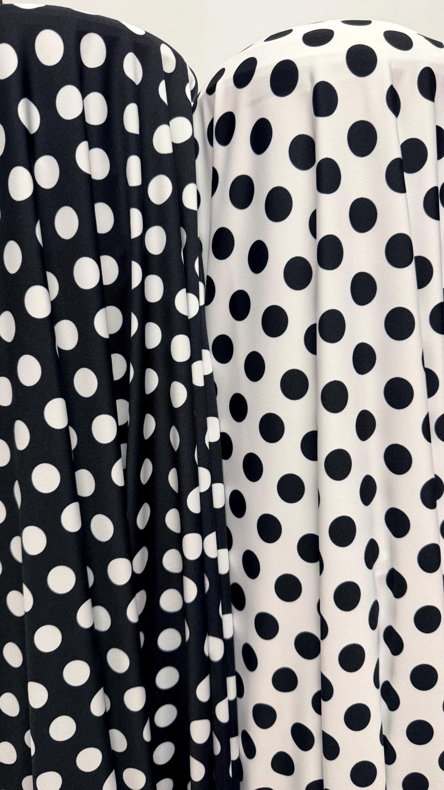 Polka dots print on poly spandex 4way stretch  58/60" sold by the Yd. Ships worldwide from Los Angeles California USA. High quality fabrics