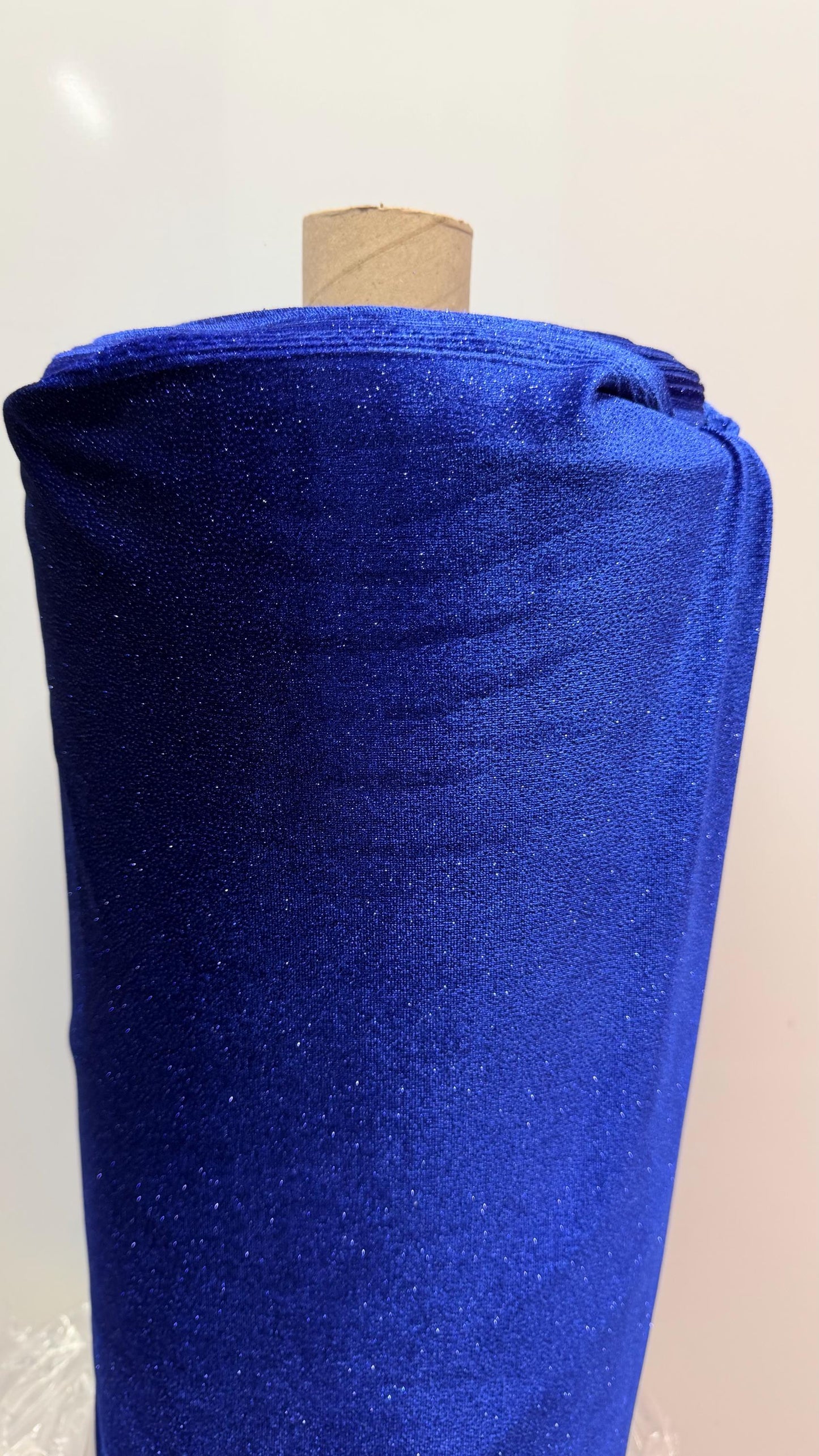 Stretch velvet with glitter Royal color heavy velvet 4way Stretch 58/60" Sold by the YD. Ships worldwide from Los Angeles California USA.