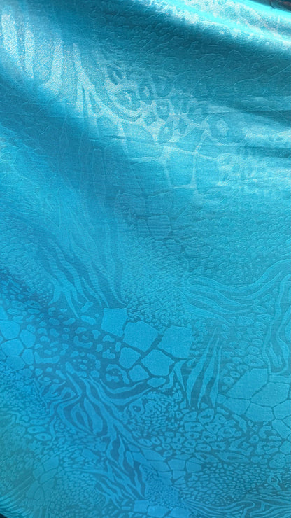 New Safari design embossed nylon spandex 4-way stretch with foil  58/60” Sold by the YD. Ships Worldwide from Los Angeles California USA