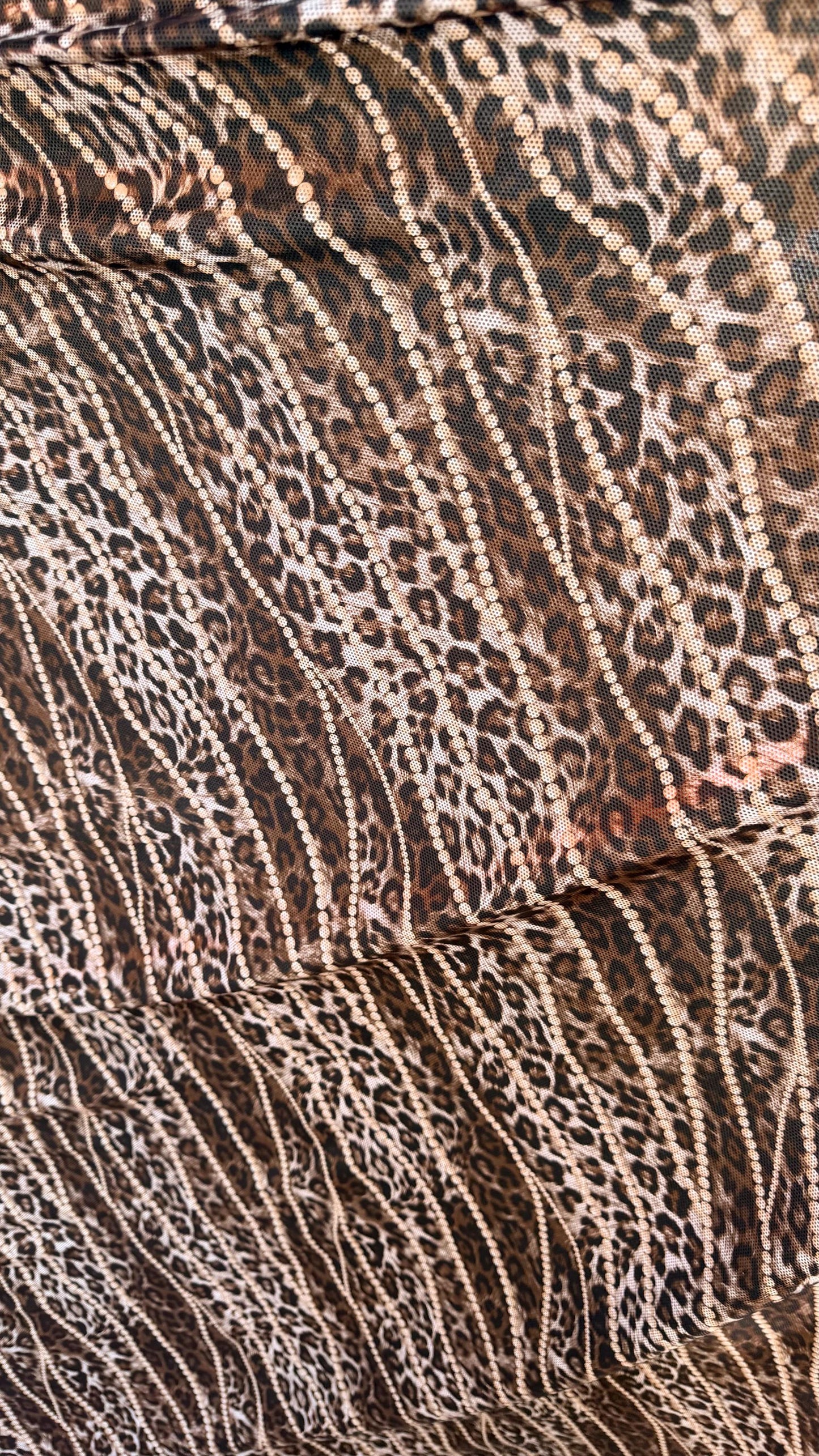 New exotic metallic leopard design poly spandex 4-way stretch  58/60” Sold by the YD. Ships worldwide from Los Angeles California USA