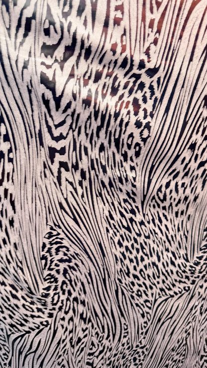New Safari design Iridescent metallic nylon spandex 4way stretch 58/60" Sold by the yd. Ships worldwide from Los Angeles California USA.