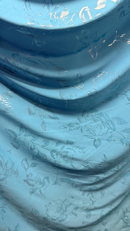 New metallic flower design on poly spandex  medium weight 2-way stretch 58/60” Sold by the YD. Ships worldwide from Los Angeles California