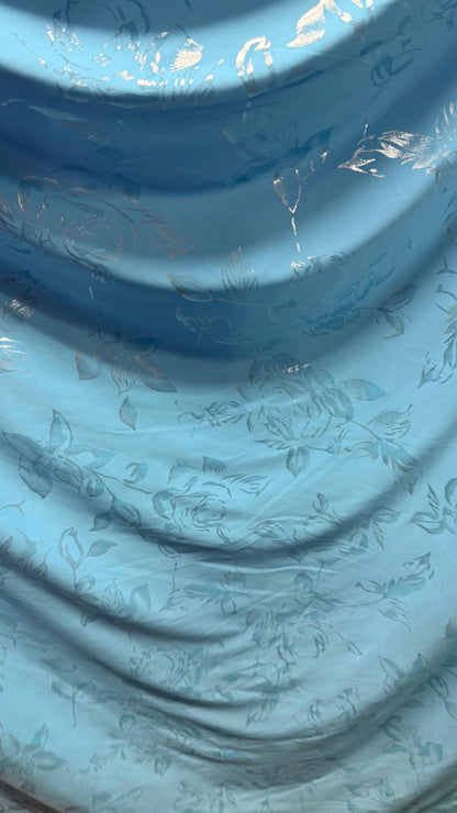 New metallic flower design on poly spandex  medium weight 2-way stretch 58/60” Sold by the YD. Ships worldwide from Los Angeles California
