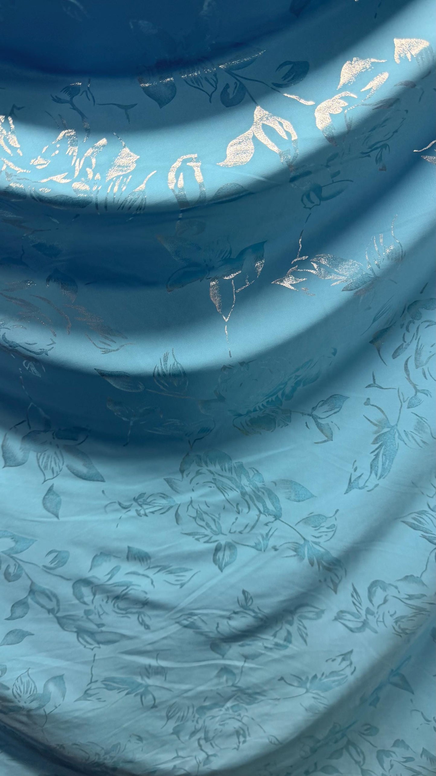 New metallic flower design on poly spandex  medium weight 2-way stretch 58/60” Sold by the YD. Ships worldwide from Los Angeles California