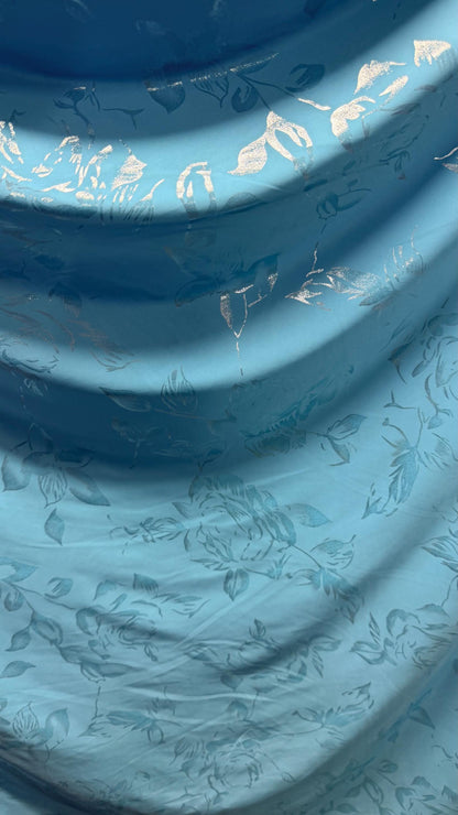 New metallic flower design on poly spandex  medium weight 2-way stretch 58/60” Sold by the YD. Ships worldwide from Los Angeles California